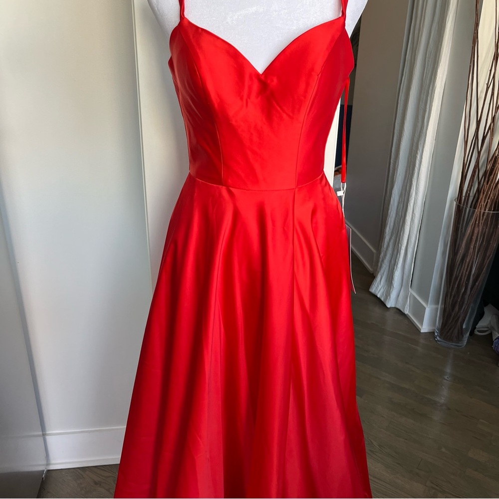 NWT. Red dress Size 2 by prom girl. Formal/prom/homecoming.